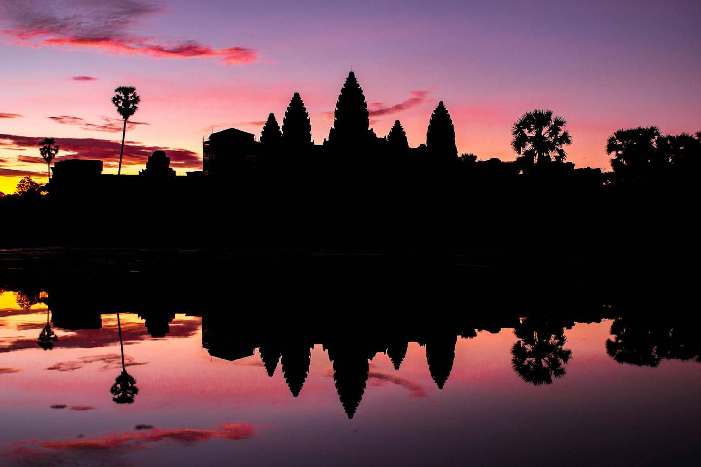 Angkor Wat silhouetted at sunrise, Cambodia