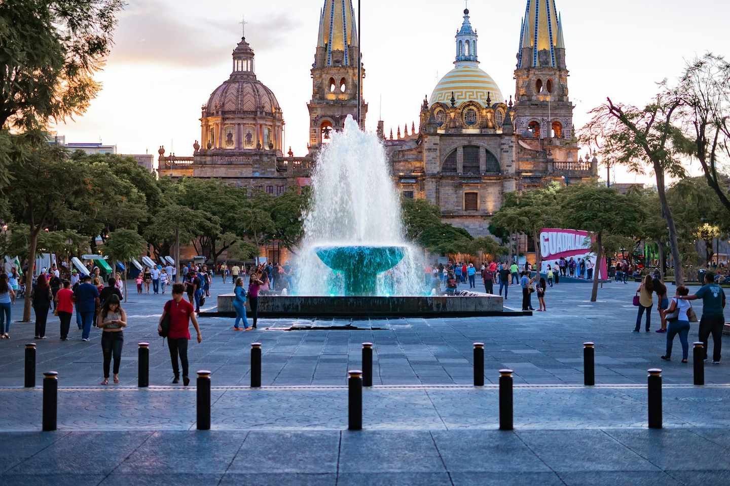 Guadalajara Cathedral and plaza fountain at golden hour, Mexico