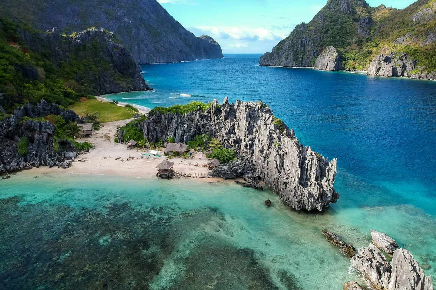 Karst cliffs and turquoise lagoon in El Nido, Palawan, Philippines