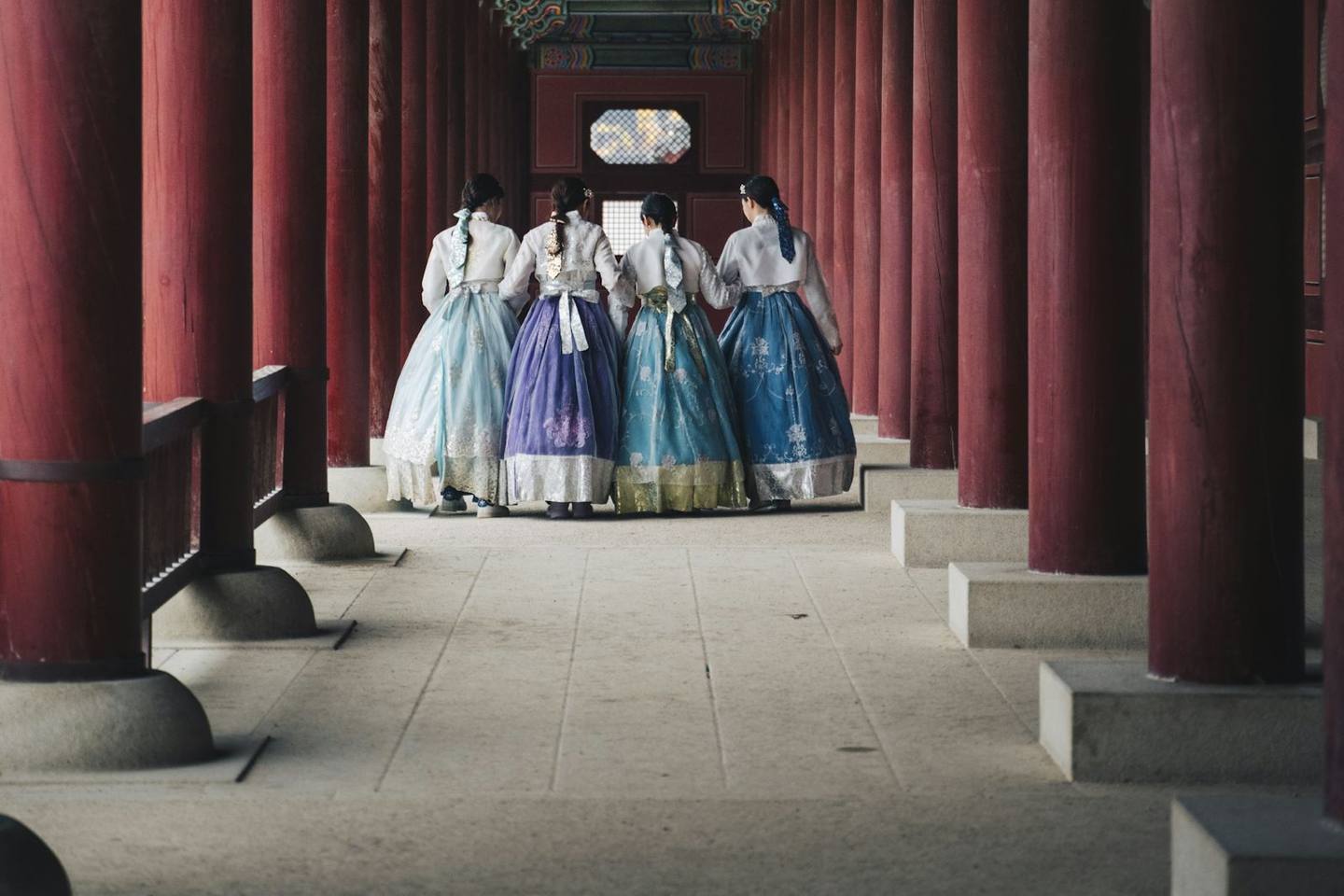 Women in traditional hanbok at Gyeongbokgung Palace, Seoul, South Korea