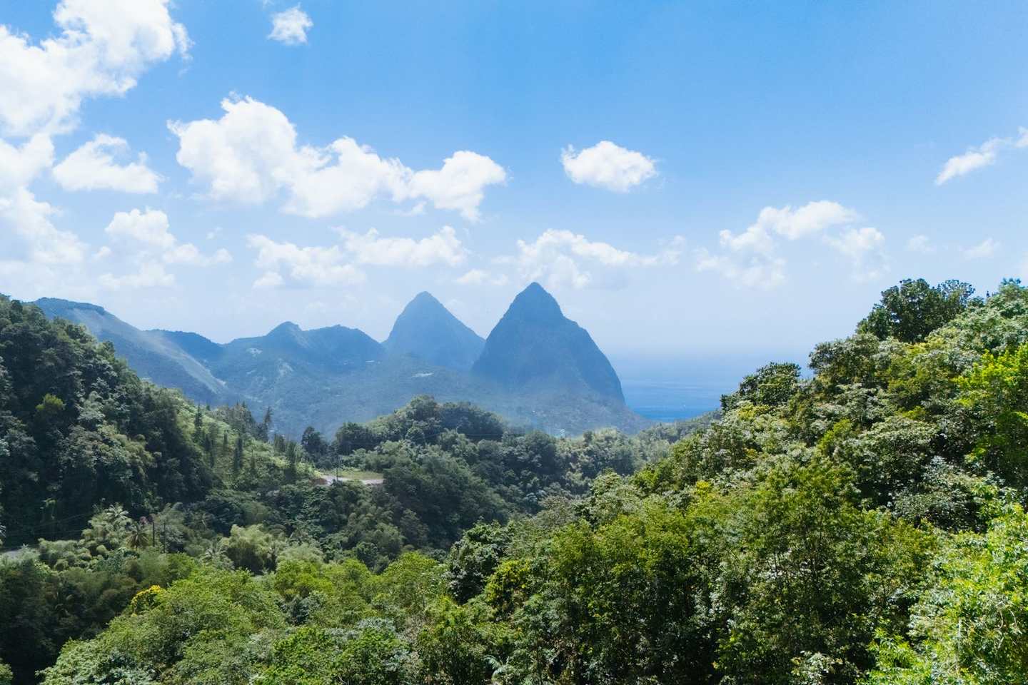 The Pitons rising above rainforest in St. Lucia
