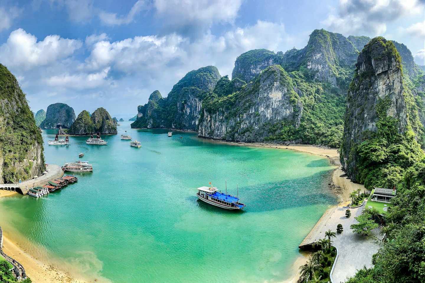 Limestone karsts rising from emerald water in Ha Long Bay, Vietnam